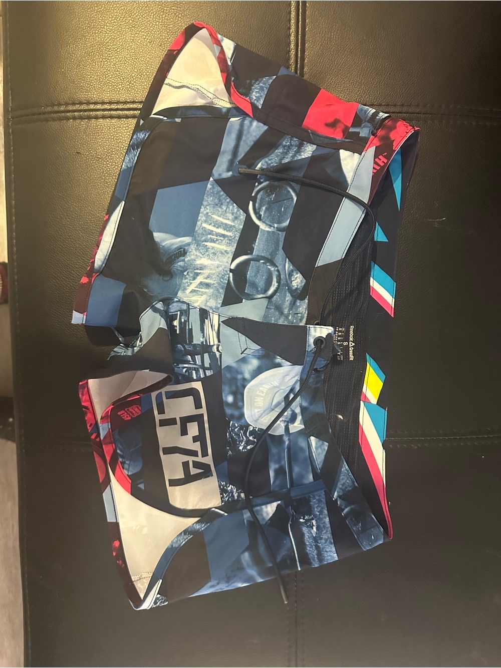 Reebok Woman Graphic short in Blue, Black & Red